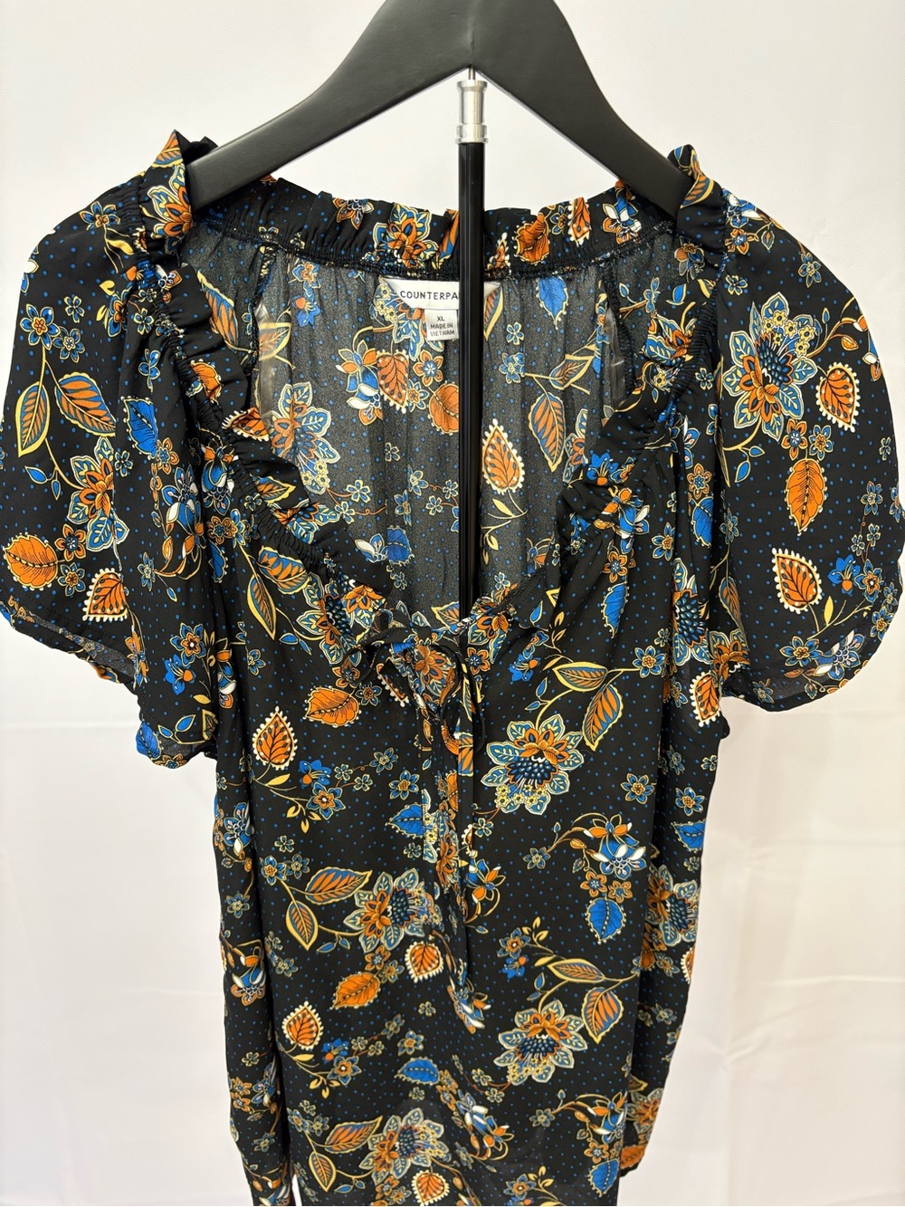 Counterparts Black Floral Tie-Neck Blouse with Blue and Orange Accents - Picture 5 of 5